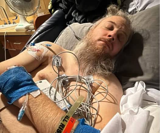 Picture of Johnny Wheels home after seizure.